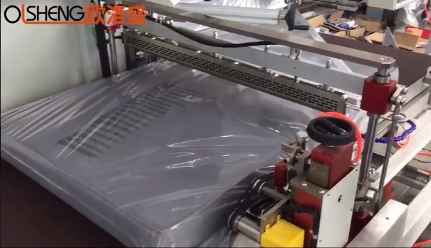 定制邊封包裝機(jī)包大海綿墊配膜打孔裝置案例視頻